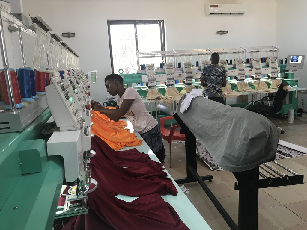 Splash Media embroidery workshop with garments in production